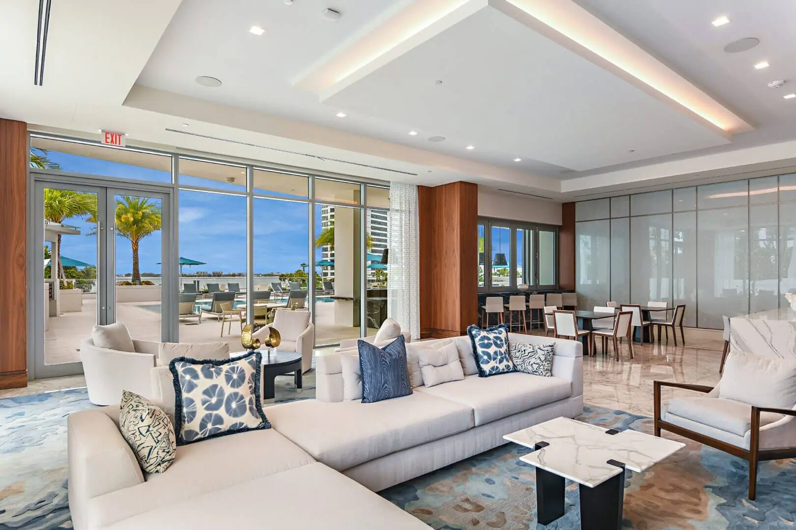 A living room with couches and tables in it