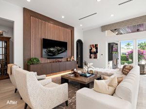 A living room with couches and chairs, a television.