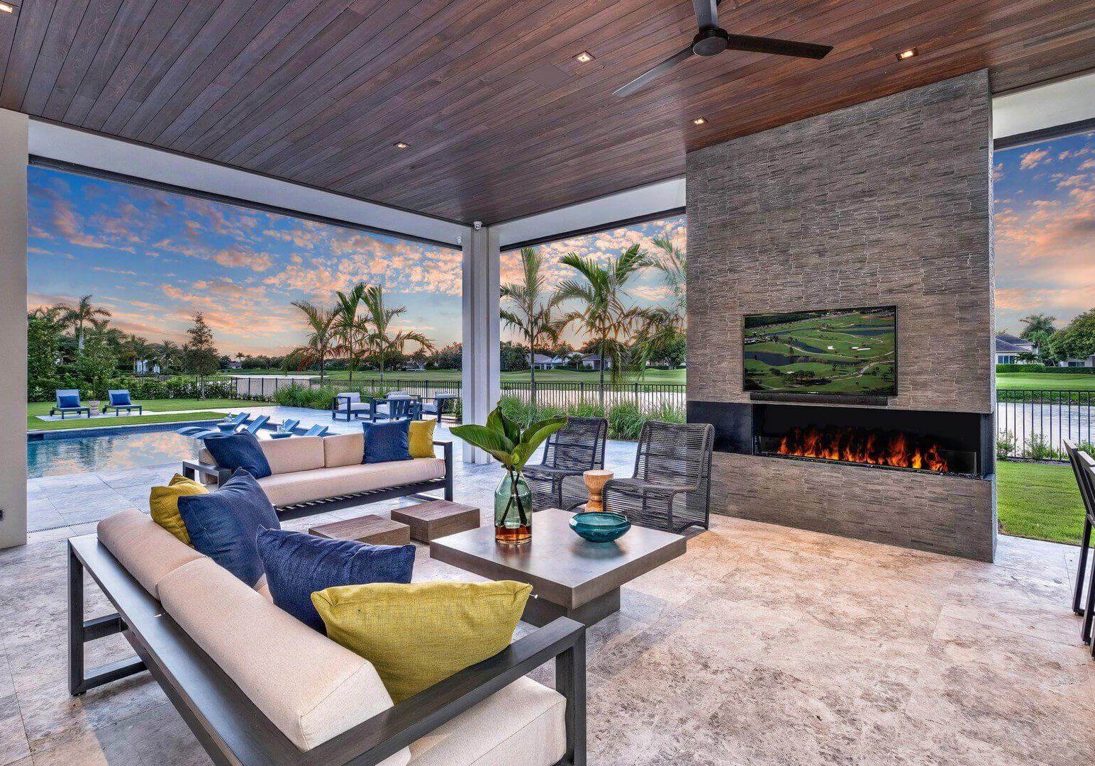 A living room with couches and a television.