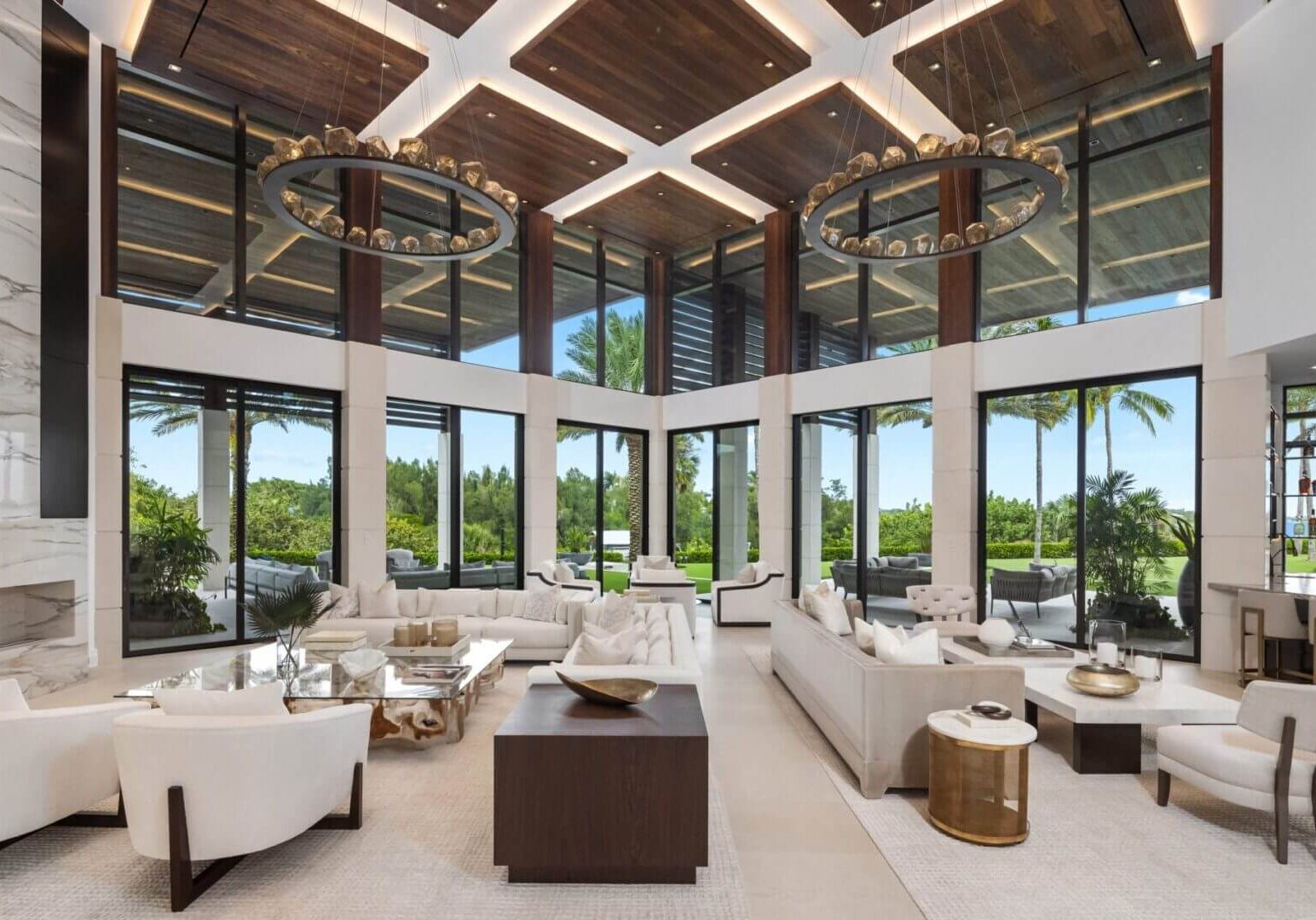 Luxurious living room with large windows.