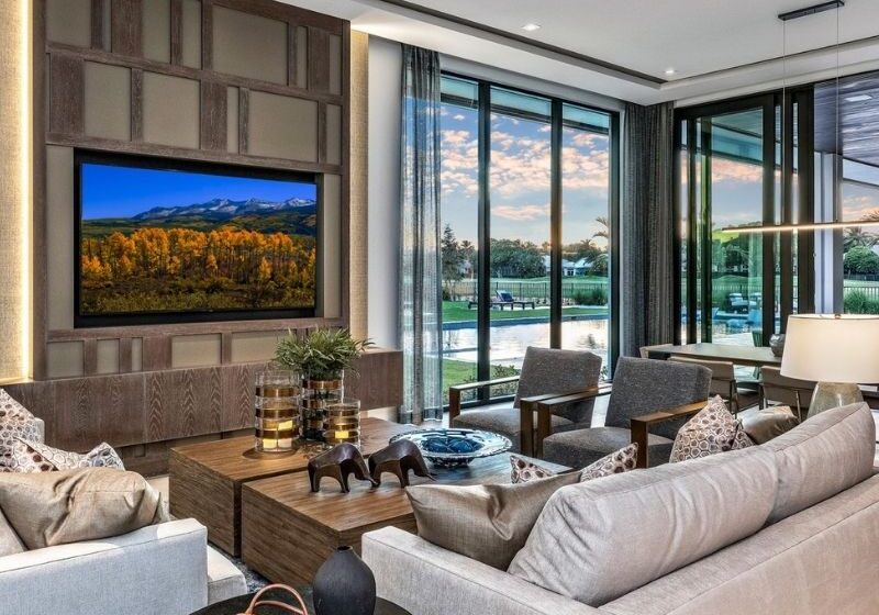 A living room with couches and tables in it